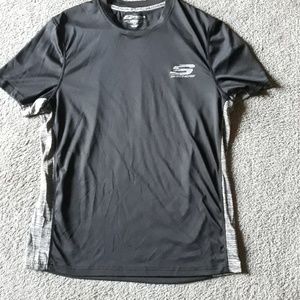 A Sketchers athletic top. In good condition.